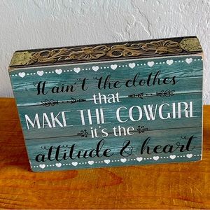 “It’s aint the clothes that make a cowgirl it’s the attitude and heart”